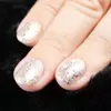 Kép 2/2 - Diamond Nails Gél Lakk DN110 Arany csillám ezüst hexagonokkal 